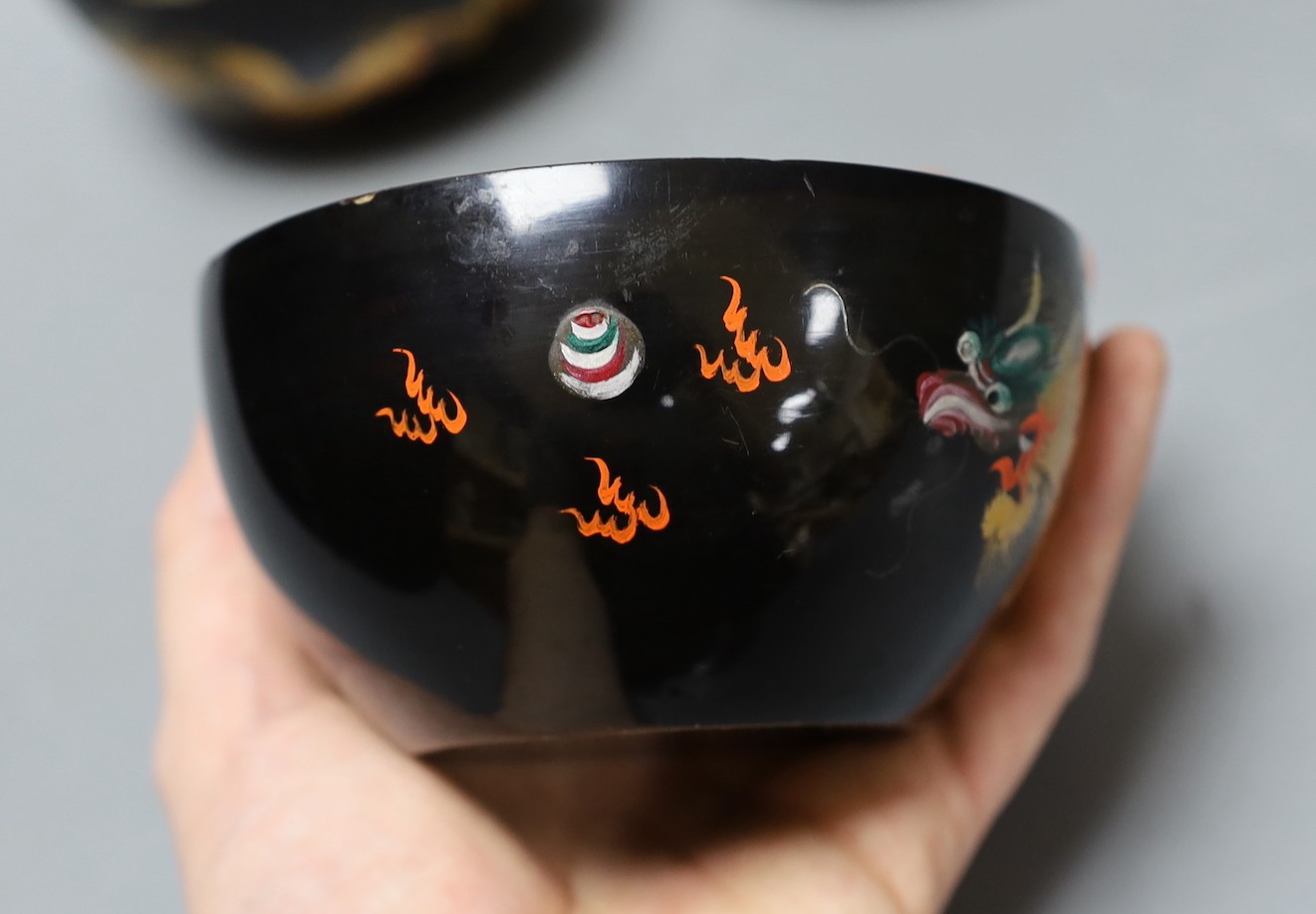 Four Chinese Republic Fuzhou lacquer dragon bowls. 11cm diameter